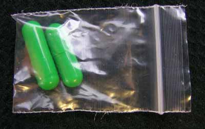 Unlabelled Bright Green Capsules. 