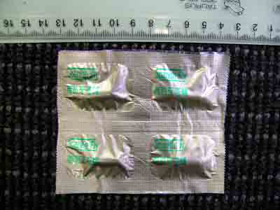 Spanish Fly Capsules in silver foil with green print