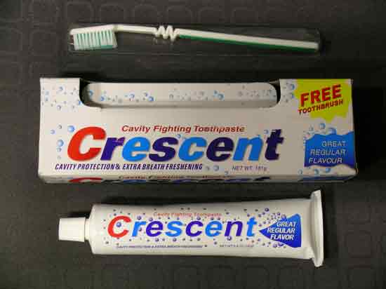 Front of Pack of Crescent Toothpaste (181gm) with Toothbrush